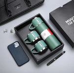 Thermos en acier inoxydable et trois gobelets